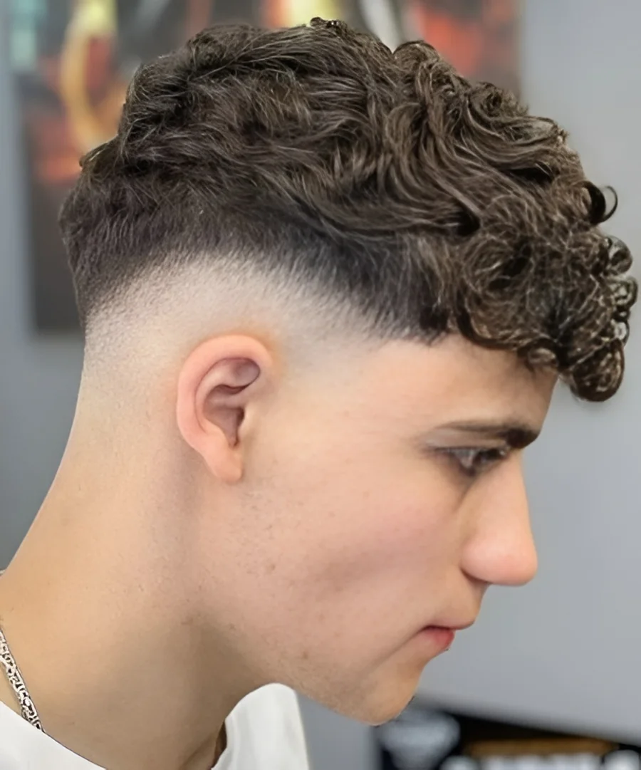 Mid drop fade curls, looser curl pattern