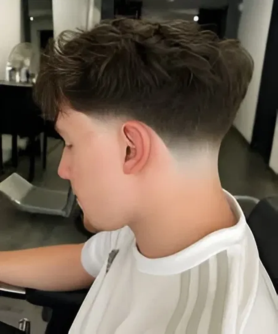 Mid taper fade, side profile