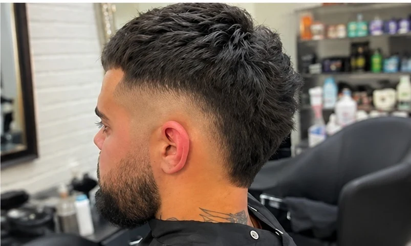 Mid drop fade back view showing the drop line and beard